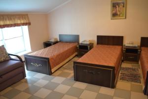 Cama o camas de una habitación en Dergachov Guest House