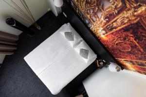 an overhead view of a table with shoes on it at Comfort Hotel LT - Rock 'n' Roll Vilnius in Vilnius