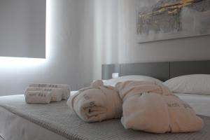 Postel nebo postele na pokoji v ubytování Kalì B&B