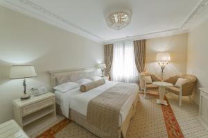 
Кровать или кровати в номере Rimar Hotel Бассейн и СПА
