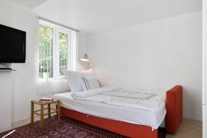 Säng eller sängar i ett rum på Private House & Bungalow by the sea