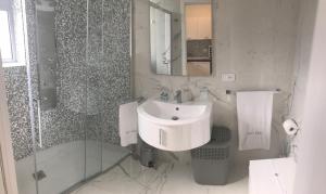 Koupelna v ubytování Kalì B&B