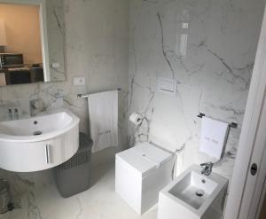 Koupelna v ubytování Kalì B&B
