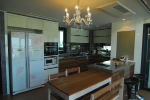 Kuchyň nebo kuchyňský kout v ubytování Dynamic Guesthouse