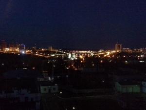 a view of a city at night with lights at Аппартаменты с видом на залив in Cheboksary