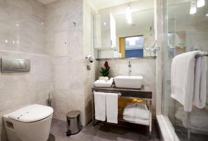 Koupelna v ubytování Housez Suites & Apartments Special Class