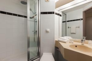 Koupelna v ubytování Brit Hotel Confort Amiens