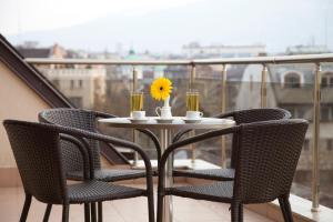 A balcony or terrace at Favorit Hotel