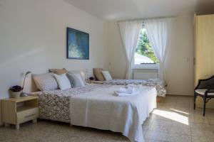 Ein Bett oder Betten in einem Zimmer der Unterkunft Vila Les Kralovstvi
