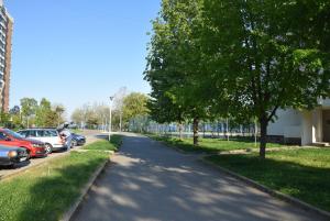a street with cars parked on the side of the road at Apartament ALBATROS in Mangalia