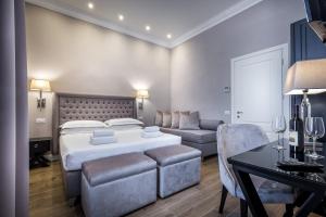 Postel nebo postele na pokoji v ubytování Hotel Emma Small Luxury Hotel