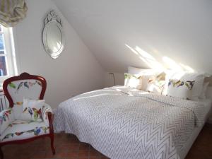 Ένα ή περισσότερα κρεβάτια σε δωμάτιο στο Biberhues-OG