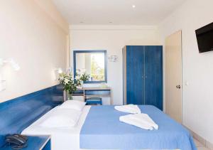 Posteľ alebo postele v izbe v ubytovaní Stefanakis Hotel & Apartments