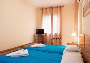 Posteľ alebo postele v izbe v ubytovaní Stefanakis Hotel & Apartments