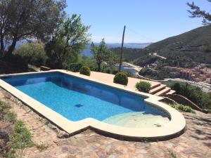 Der Swimmingpool an oder in der Nähe von Villa Bella Portbou