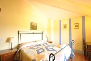 Een bed of bedden in een kamer bij Misciano