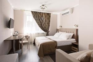 Postel nebo postele na pokoji v ubytování Time Hotel