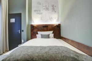 Krevet ili kreveti u jedinici u okviru objekta Boutique Essen City