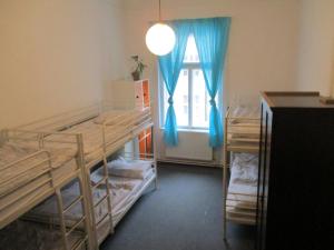 Postel nebo postele na pokoji v ubytování Hostel Franz Kafka