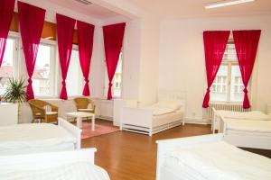 Postel nebo postele na pokoji v ubytování Hostel Franz Kafka