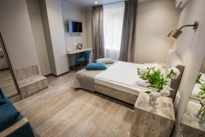 Postel nebo postele na pokoji v ubytování Time Hotel