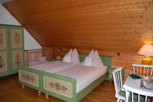 Giường trong phòng chung tại Gasthof Martinihof