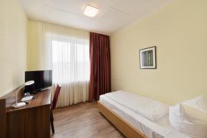 Μια τηλεόραση ή/και κέντρο ψυχαγωγίας στο Hotel Schumacher Düsseldorf