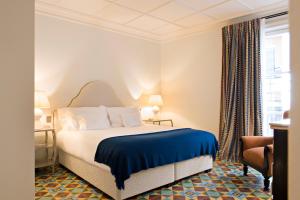 Postel nebo postele na pokoji v ubytování Hotel Cappuccino - Palma