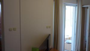 TV a/nebo společenská místnost v ubytování Apartment Studio A2_Medulin