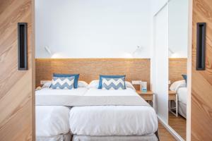 Posteľ alebo postele v izbe v ubytovaní Grupotel Picafort Beach