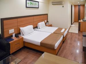 Cama o camas de una habitación en Hotel Windsor 22 fotos más