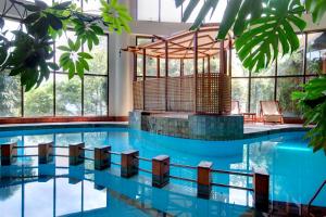Bazén v ubytování Club Himalaya, by ACE Hotels nebo v jeho okolí