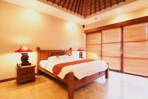 Кровать или кровати в номере Ajanta Villa
