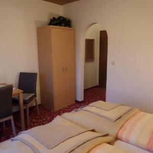 Letto o letti in una camera di Gästehaus ERLE
