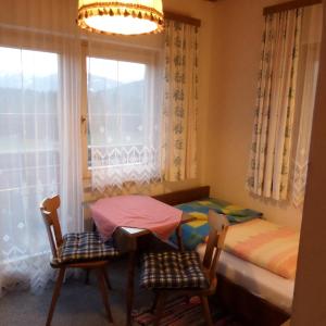 Letto o letti in una camera di Gästehaus ERLE
