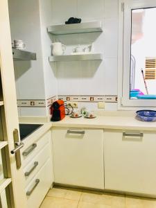 A kitchen or kitchenette at Apartamento en la Playa