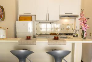 Kuchyň nebo kuchyňský kout v ubytování Blue Wood Apartment + 7 fotografií