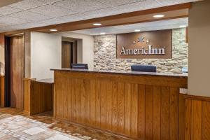 The lobby or reception area at AmericInn by Wyndham Monroe