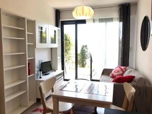 TV/trung tâm giải trí tại Appartement Ultra cosy front de mer