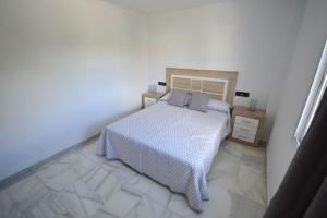 Cama o camas de una habitación en Apartamento Arena Beach