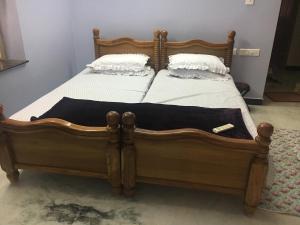 En eller flere senge i et værelse på Pleasant Stay