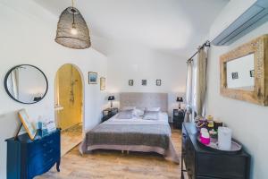 Ένα ή περισσότερα κρεβάτια σε δωμάτιο στο Maison Sadina