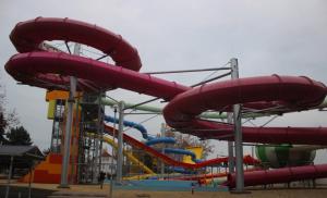 a large water slide in a park at Geri Apartman in Mezőkövesd