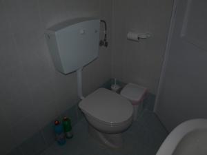 a small bathroom with a toilet and a sink at Alatsaria House in Cherronisos +27 photos