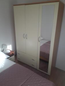 Postel nebo postele na pokoji v ubytování Apartments Šime