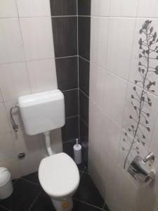 Koupelna v ubytování Apartments Šime
