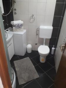 Koupelna v ubytování Apartments Šime