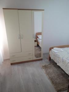 Postel nebo postele na pokoji v ubytování Apartments Šime