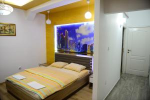 Кровать или кровати в номере Apartments MM