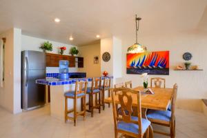 Kuchyň nebo kuchyňský kout v ubytování Aquatech Villas DeRosa Resort